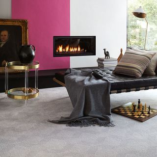 living area with carpet flooring and fire place