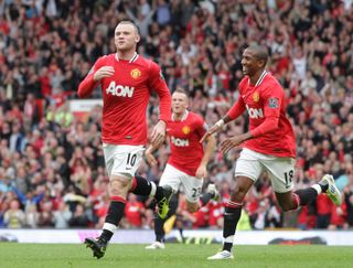 Wayne Rooney celebrates after scoring for Manchester United against Arsenal in August 2011.