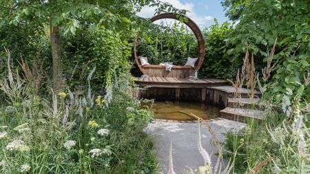 garden retreat design with pond, deck and steps, plus immersive perennial planting and trees