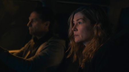 Rosamund Pike and Matthew Rhys driving ahead in Hallow Road.