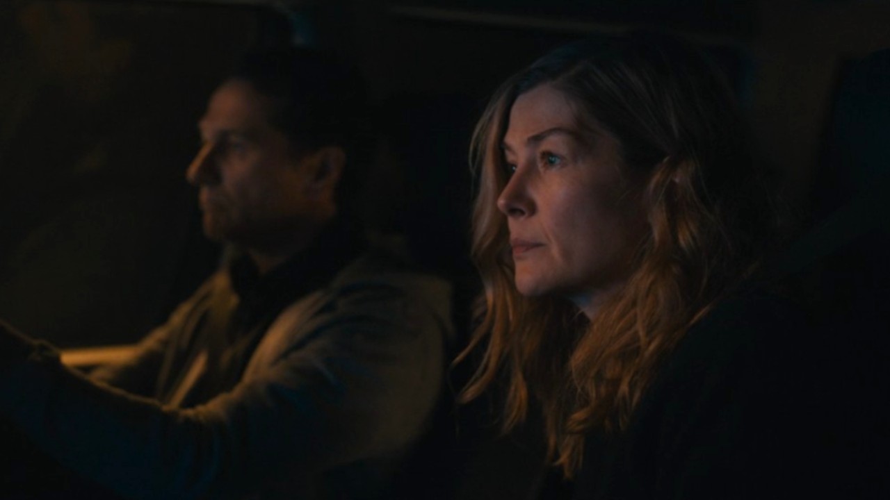 Rosamund Pike and Matthew Rhys driving ahead in Hallow Road.