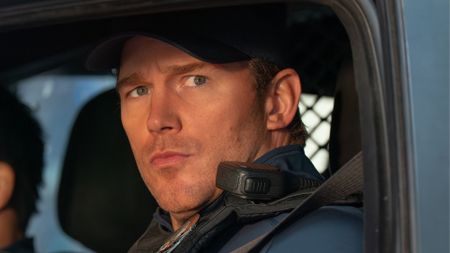 Chris Pratt stares out of a car window