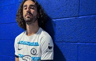 Marc Cucurella in a Chelsea shirt after signing from Brighton in the summer