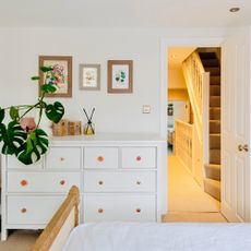 bedroom with white chest of drawers