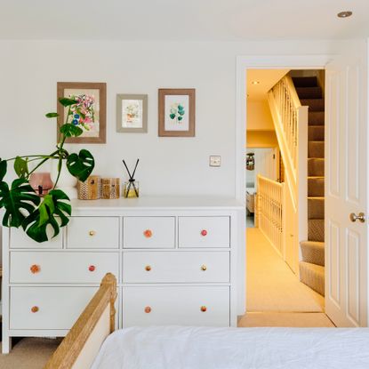 bedroom with white chest of drawers