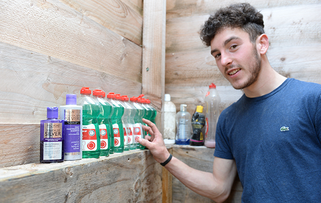 Zak Vaughan-Jones with his washing-up liquid at Sarah &amp;amp; Simon Parker's yard at Glebe Farm in Bronington near Whitcurch in Shropshire, UK on the 1st March 2016