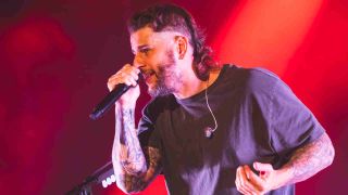 Avenged Sevenfold&rsquo;s M Shadows performing onstage in 2024