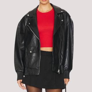 Flat lay image of woman wearing black biker jacket 