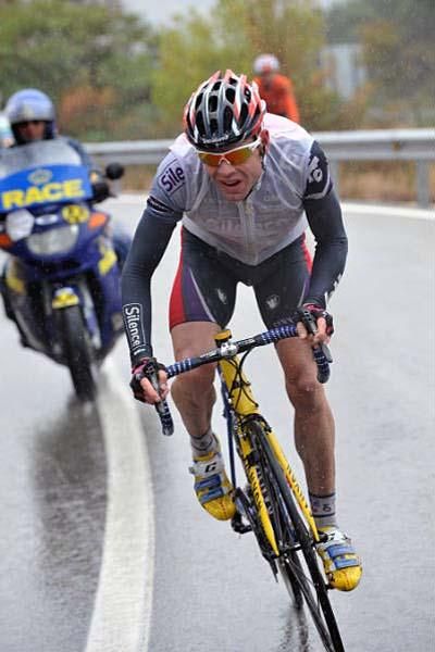 Cadel Evans (Silence-Lotto) races in the rain