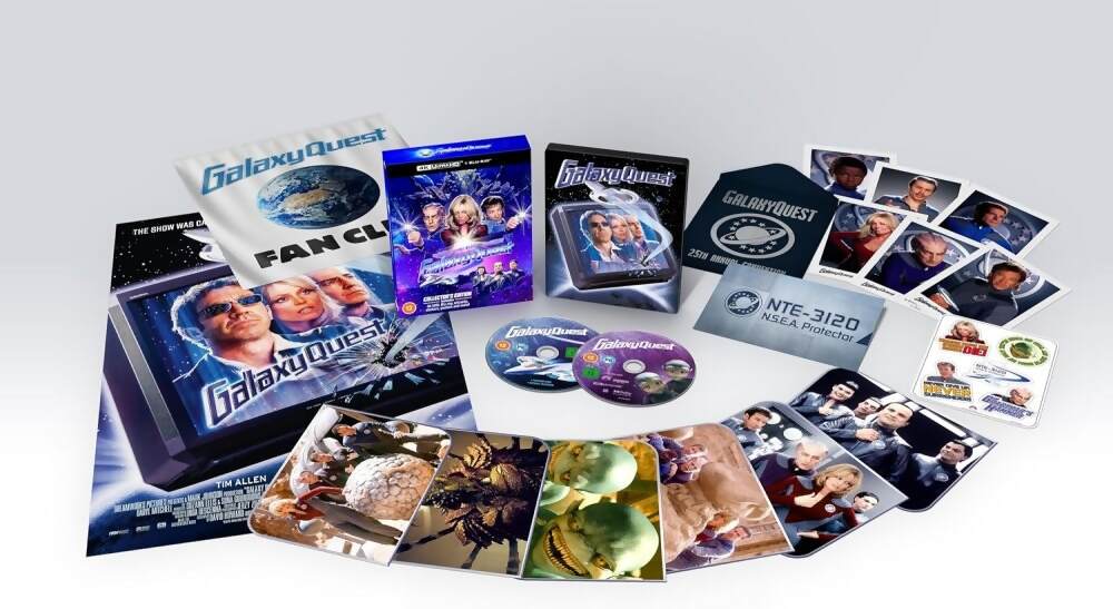 A collection of Blu-ray discs, posters and character cards for a home video product