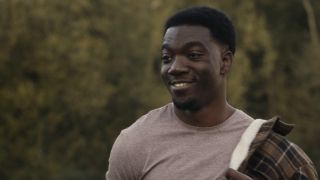 Kojo Attah smiling on Midsomer Murders