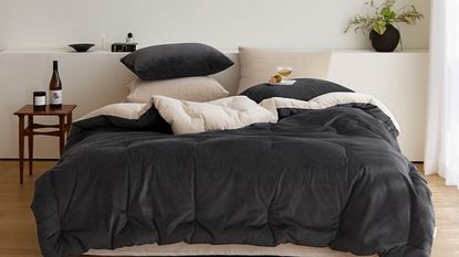 A set of Maatila bedding - the Winter Hotel Micro Fiber Comforter on a bed.