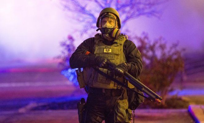 Police officers in riot gear