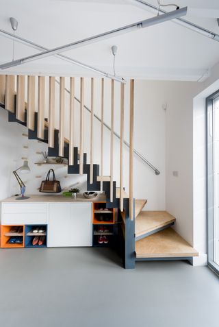 Modern staircase with storage below