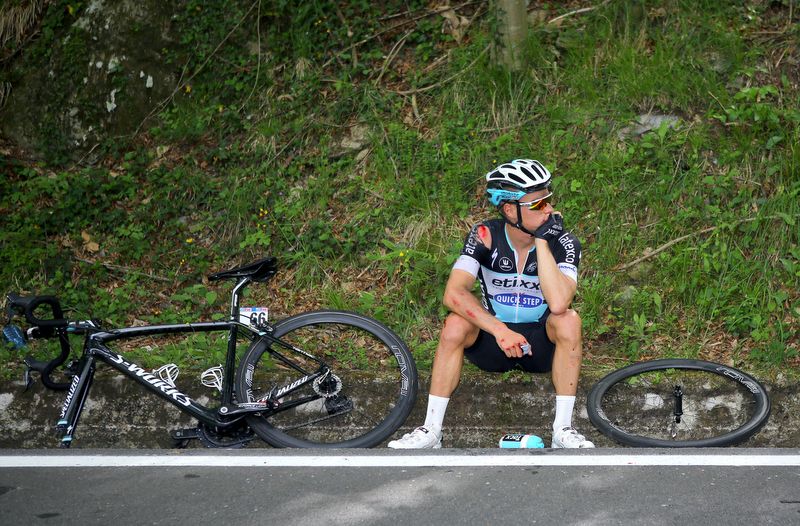 Gianni Meersman waiting for support after crashing