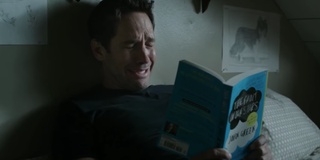 Paul Rudd as Scott Lang reading The Fault in Our Stars in Ant-Man and the Wasp