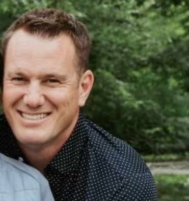 A headshot of  Chris Apfelstadt 