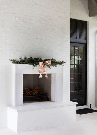 Outdoor fireplace decorated for Christmas