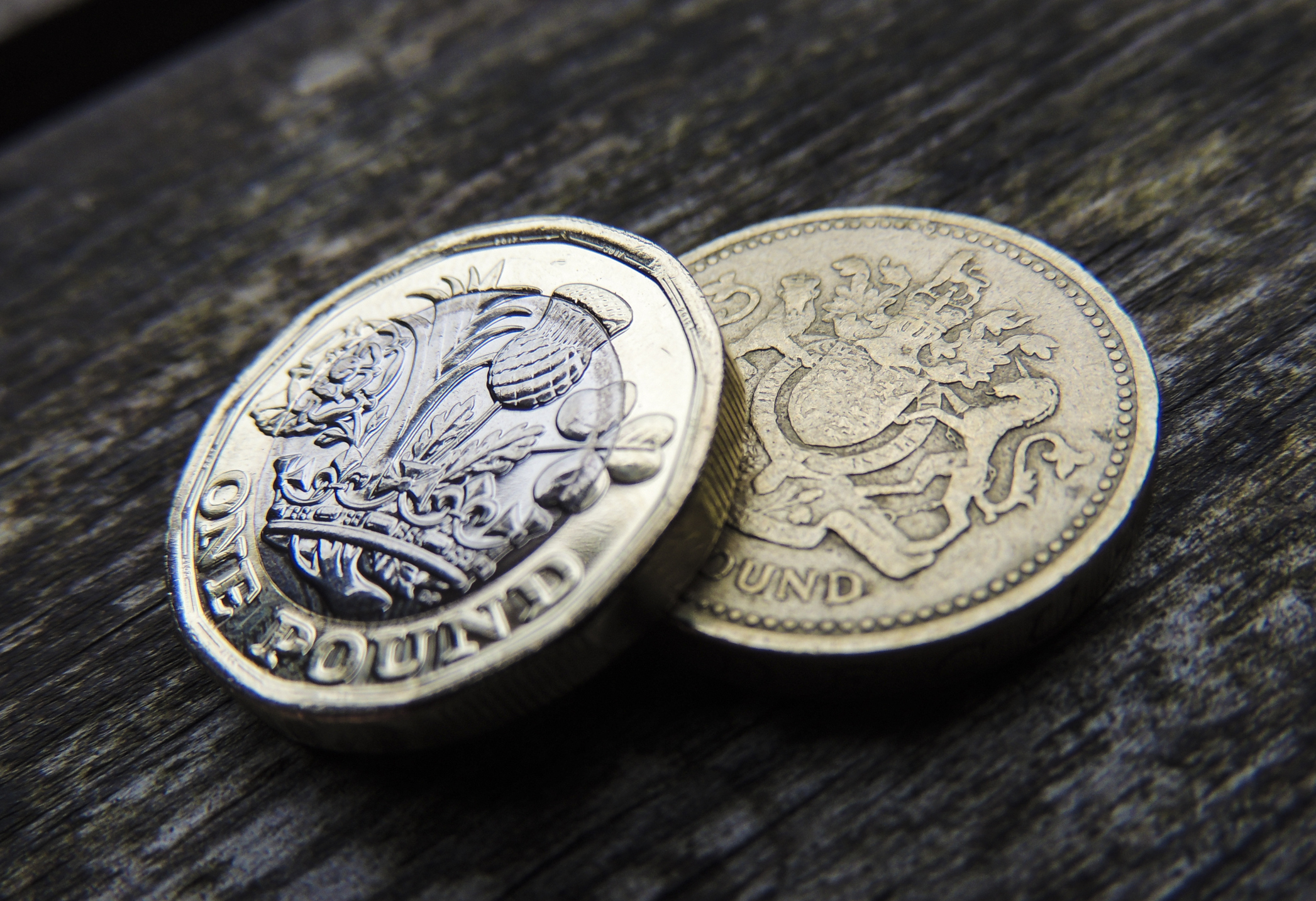New and old one pound coins
