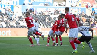 Matt Grimes curled home the opener at the Liberty Stadium