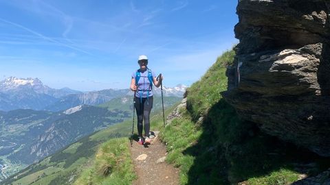 Woman hiking in the Swiss Alps