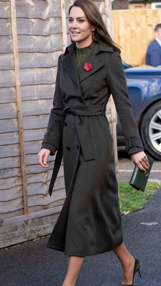 Kate Middleton's khaki trench coat: Catherine, Princess of Wales, Patron of the Maternal Mental Health Alliance, visits Colham Manor Children's Centre with the Maternal Mental Health Alliance to highlight the life-changing impact that the provision of an integrated, multi-disciplinary system of holistic care can have for families impacted by perinatal mental health issues on November 9, 2022 in Uxbridge, England.