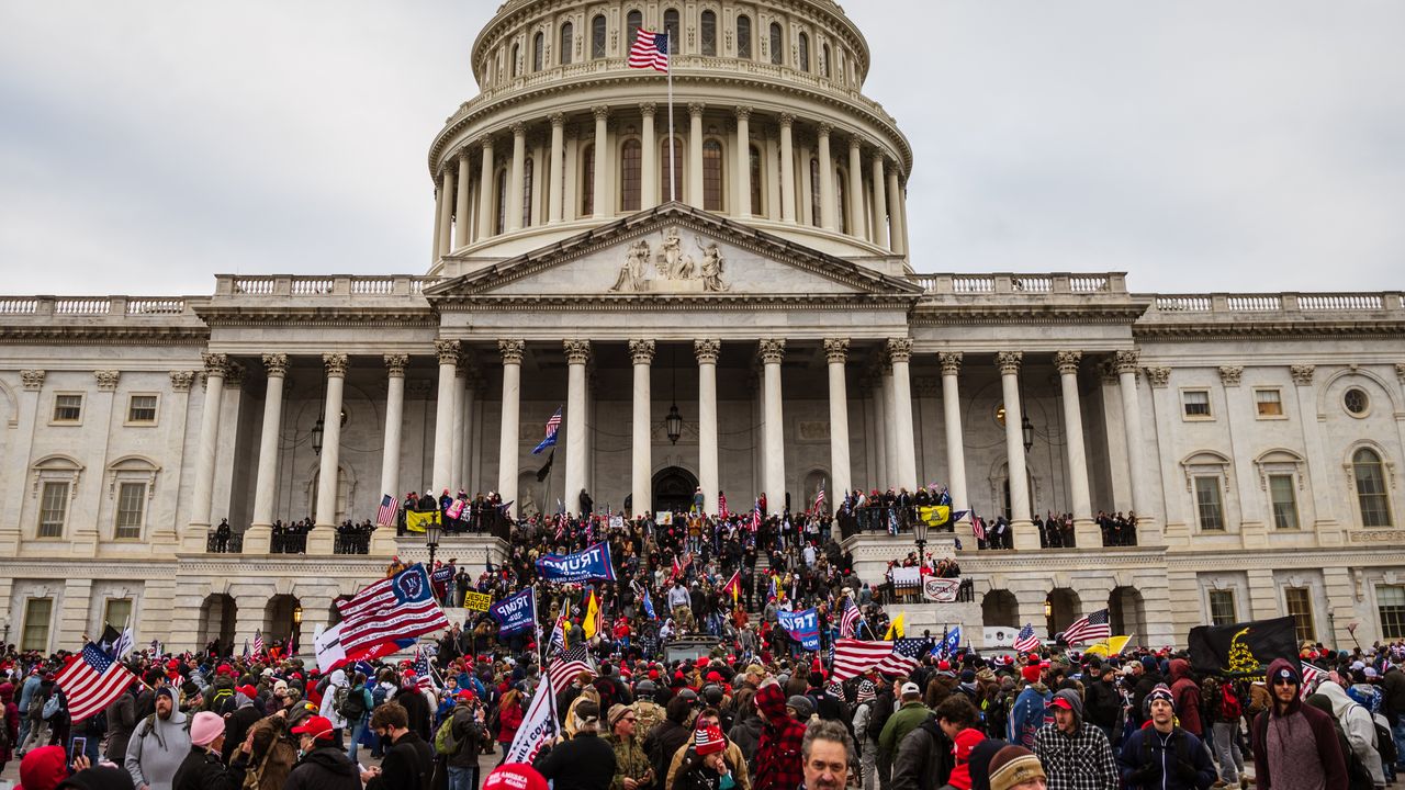 Pro-Trump protesters storm the Captiol building.