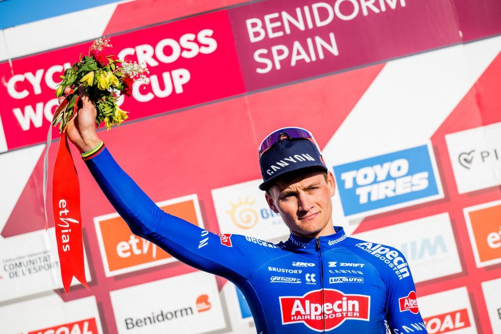 Dutch Mathieu Van Der Poel celebrates on the podium after winning the mens elite race at the Cyclocross World Cup cyclocross event in Benidorm Spain Sunday 22 January 2023 the thirteenth stage out of 14 in the World Cup of the 20222023 season BELGA PHOTO JASPER JACOBS Photo by JASPER JACOBS BELGA MAG Belga via AFP Photo by JASPER JACOBSBELGA MAGAFP via Getty Images