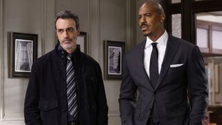 Reid Scott and Mehcad Brooks as Riley and Shaw at work in Law & Order season 23 