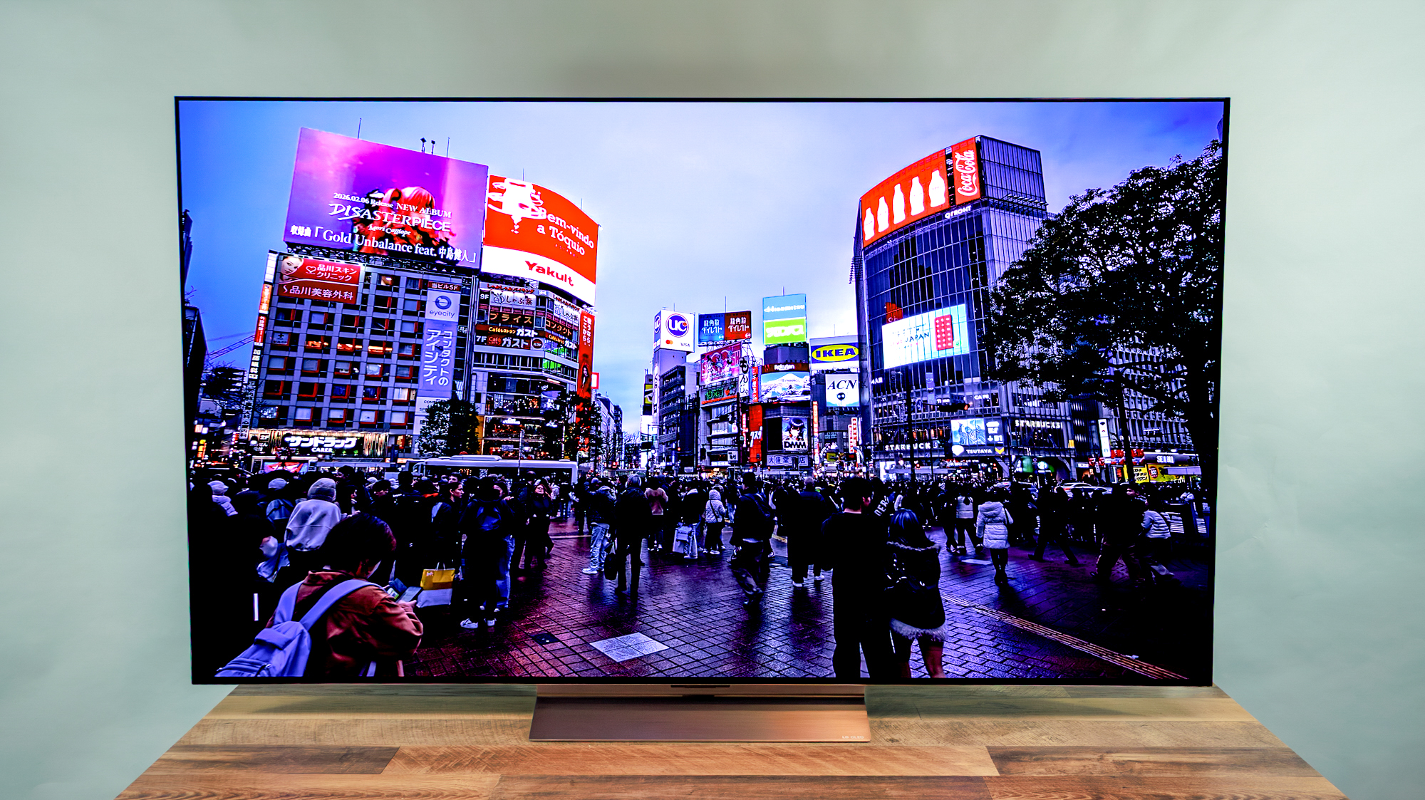 LG C6 OLED TV shown on a wood table