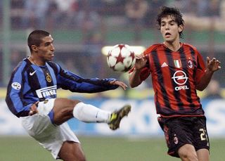 Inter's Ivan Cordoba is challenged by AC Milan's Kaka Gattuso during the Italian Serie A match between AC Milan and Inter Milan at the Guiseppe Meazza San Siro stadium, on October 24, 2004 in Milan, Italy.