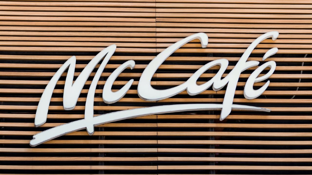 Signage of McCafe, a coffee-house-style food and drink chain, owned by McDonald&#039;s, is seen in Hong Kong, Hong Kong, on August 02, 2018. McDonald&#039;s reported its second quarter 2018 results, sales at company-owned restaurants plunged by 27 percent during the second quarter and sales at U.S. locations that have been open at least a year grew by 2.6 percent.