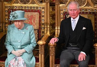 Queen Elizabeth II and Prince Charles, Prince of Wales attend the State Opening of Parliament in the House of Lord's Chamber on December 19, 2019 in London, England