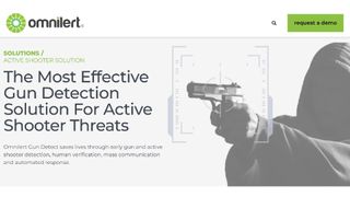 Omnilert website homepage showing hooded figure holding a gun