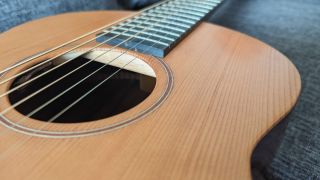 Close up of the Redwood top on a Sheeran by Lowden W05 acoustic guitar