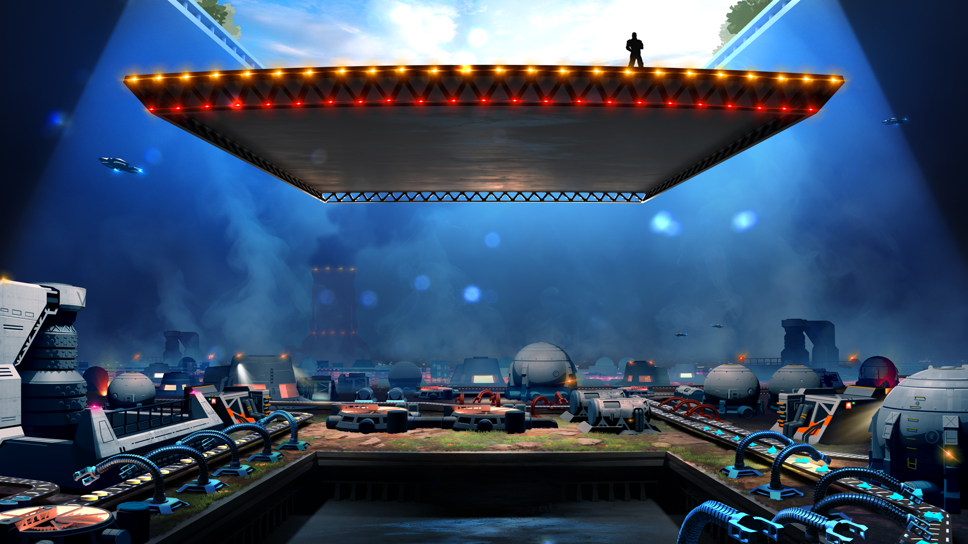 A man stands in a power pose on a platform being lowered into a dark space with assembly lines