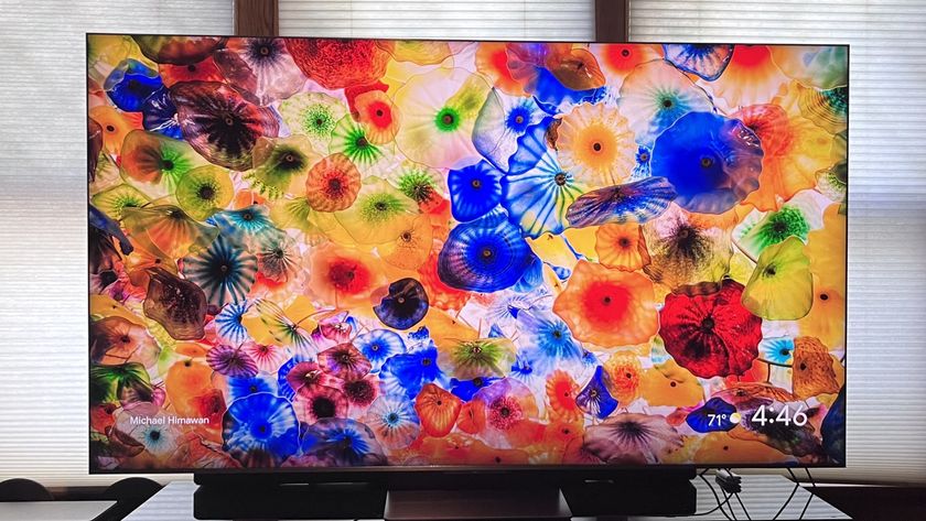 TCL QM9K showing colorful abstract image