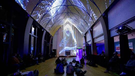 The high-arching ceilings at Historic Rhode Island church are alit with Epson projectors. 