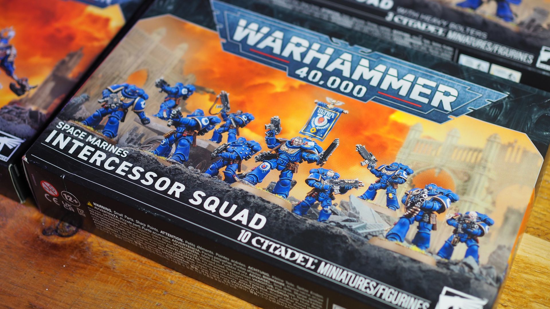 Intercessor Squad box on a wooden table