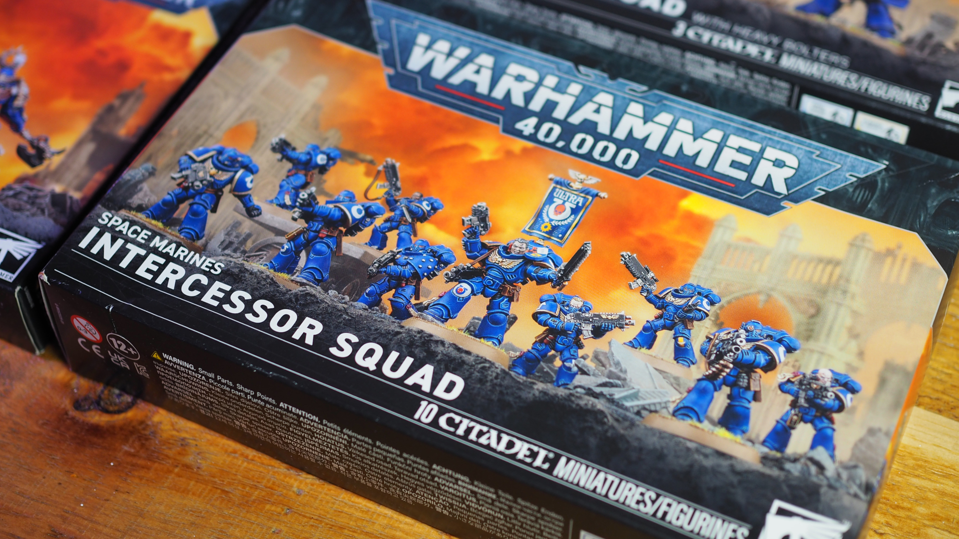 Intercessor Squad box on a wooden table