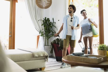 Couple entering a flat