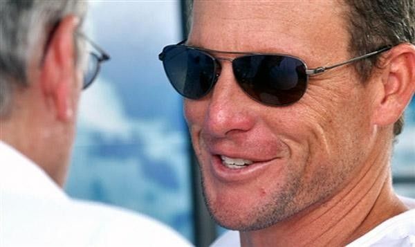 Lance Armstrong returned to the Tour de France on Saturday to watch his young rider Alberto Contador defend the yellow jersey on the penultimate stage.