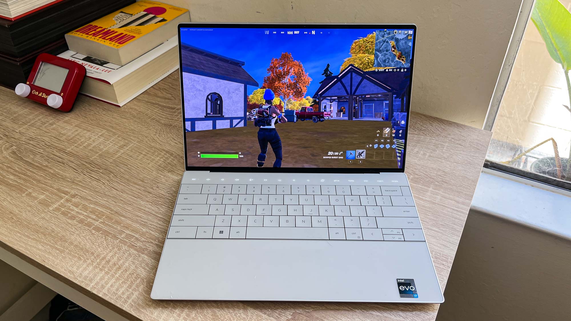 Dell XPS 13 Plus (2023) review unit on table running Fortnite