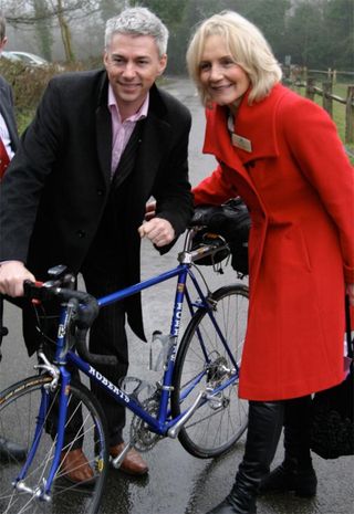 LOCOG board member and Olympic Gold Medallist Jonathan Edwards poses with Surrey County Council Cabinet member Denise Saliagopoulos at the top of Box Hill.
