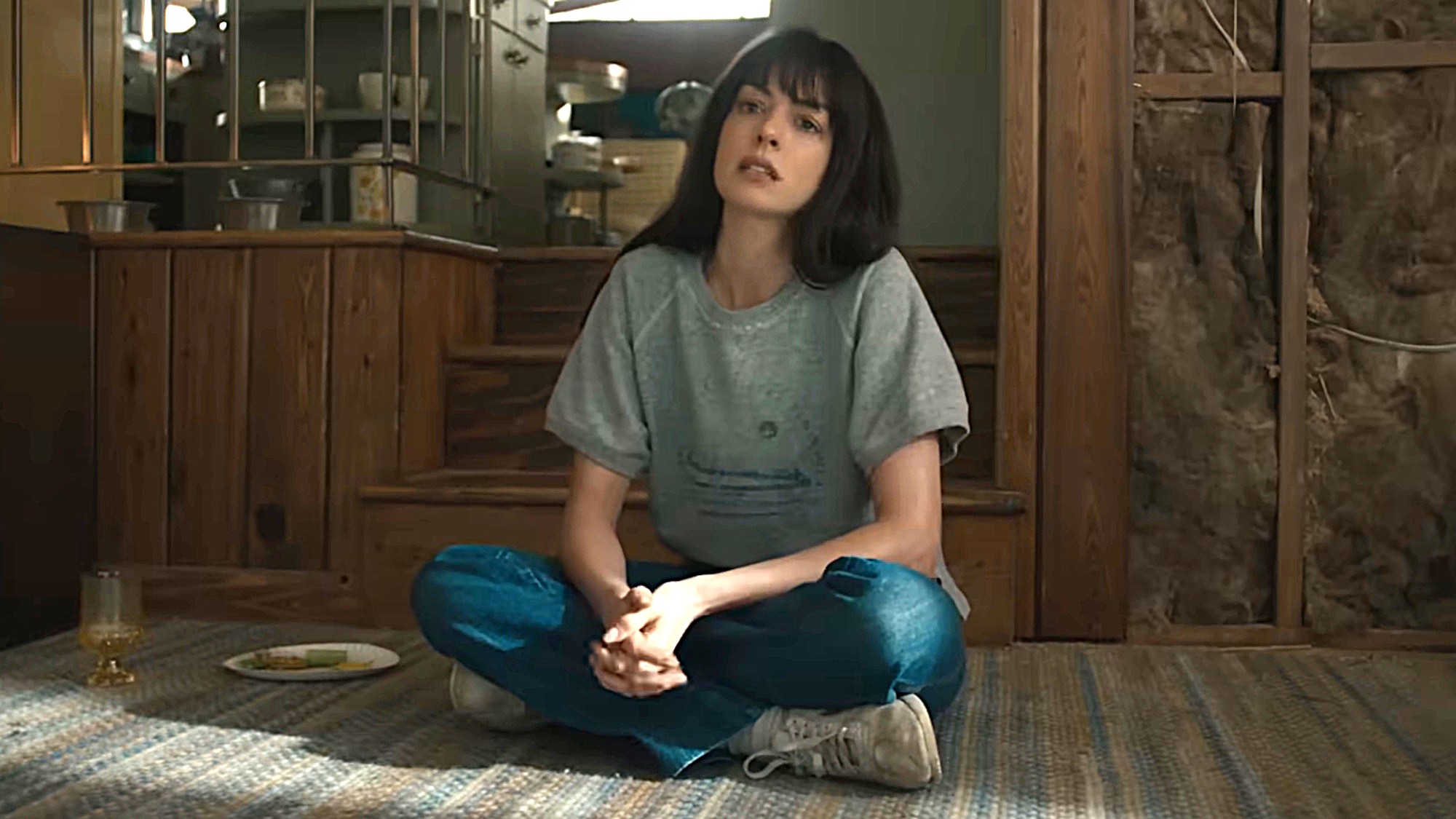 Anne Hathaway is shown in The End of Oak Street.
