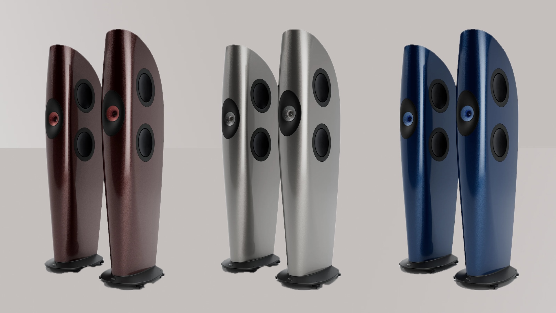 Three new colours of Blade Meta speakers on a grey background