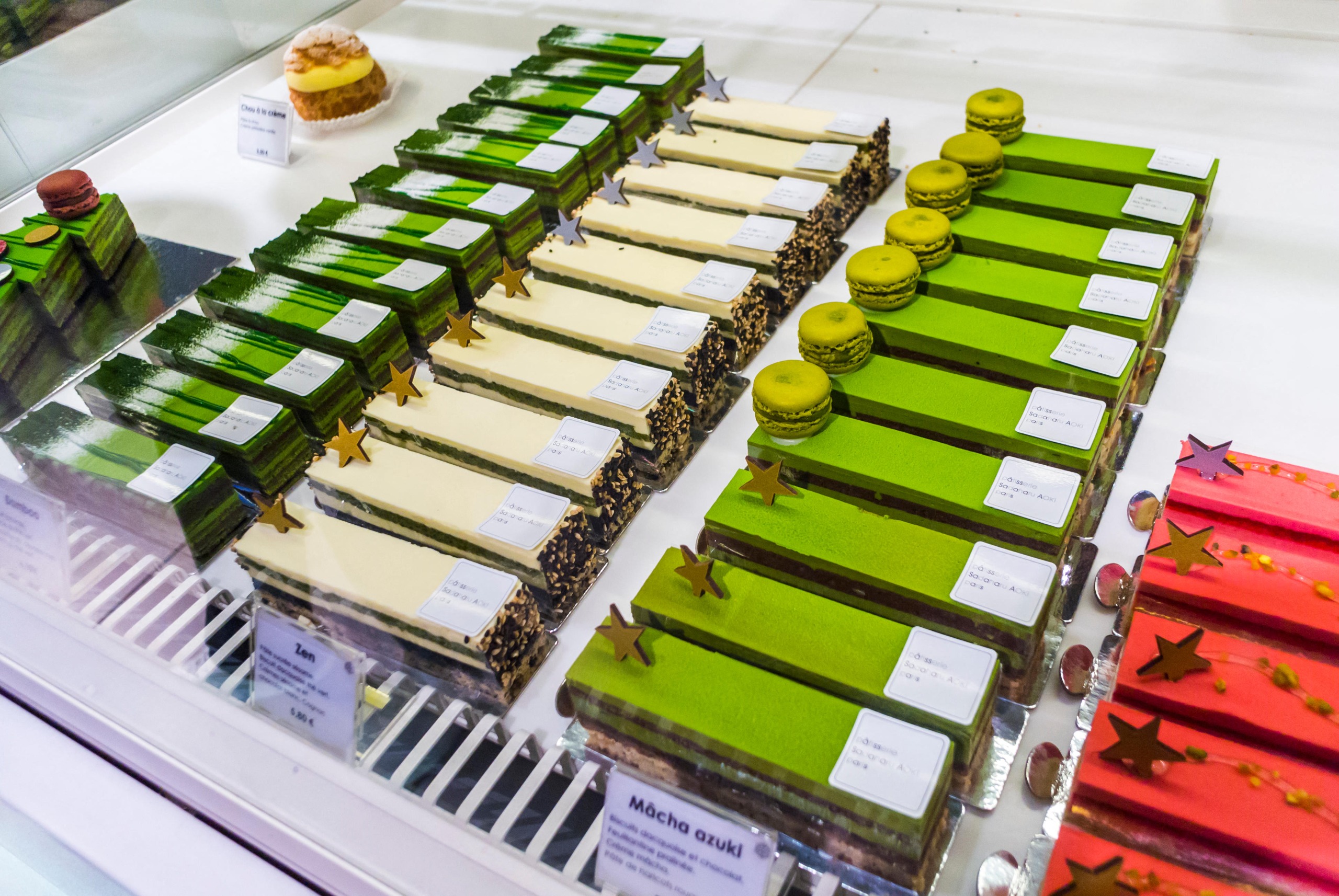 A row of sweet treats, including macarons, by Sadaharu Aoki