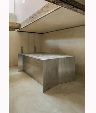 Completedworks jewellery showroom with industrial aluminium table