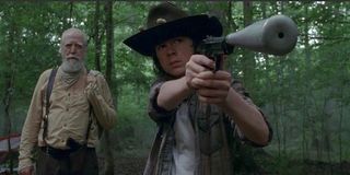 Carl and Hershel in the woods