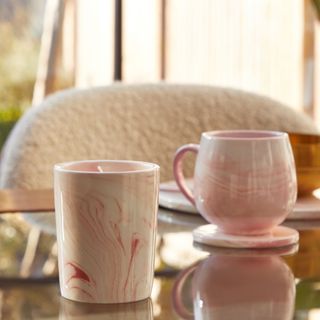 PrettyLittleThing pink marbled mugs on table